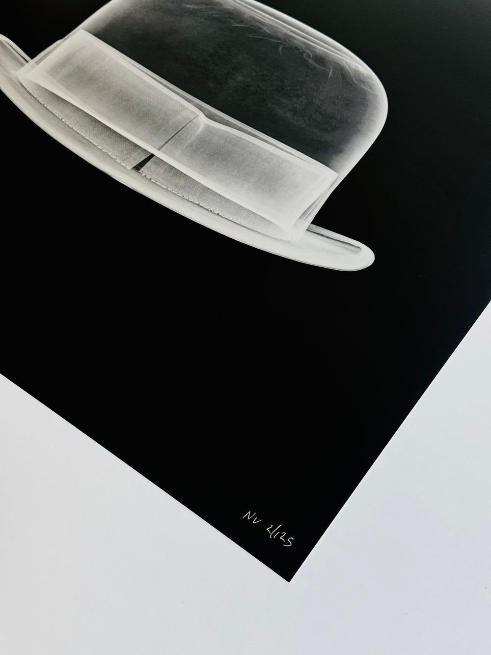 SiLVER BOWLER HAT.