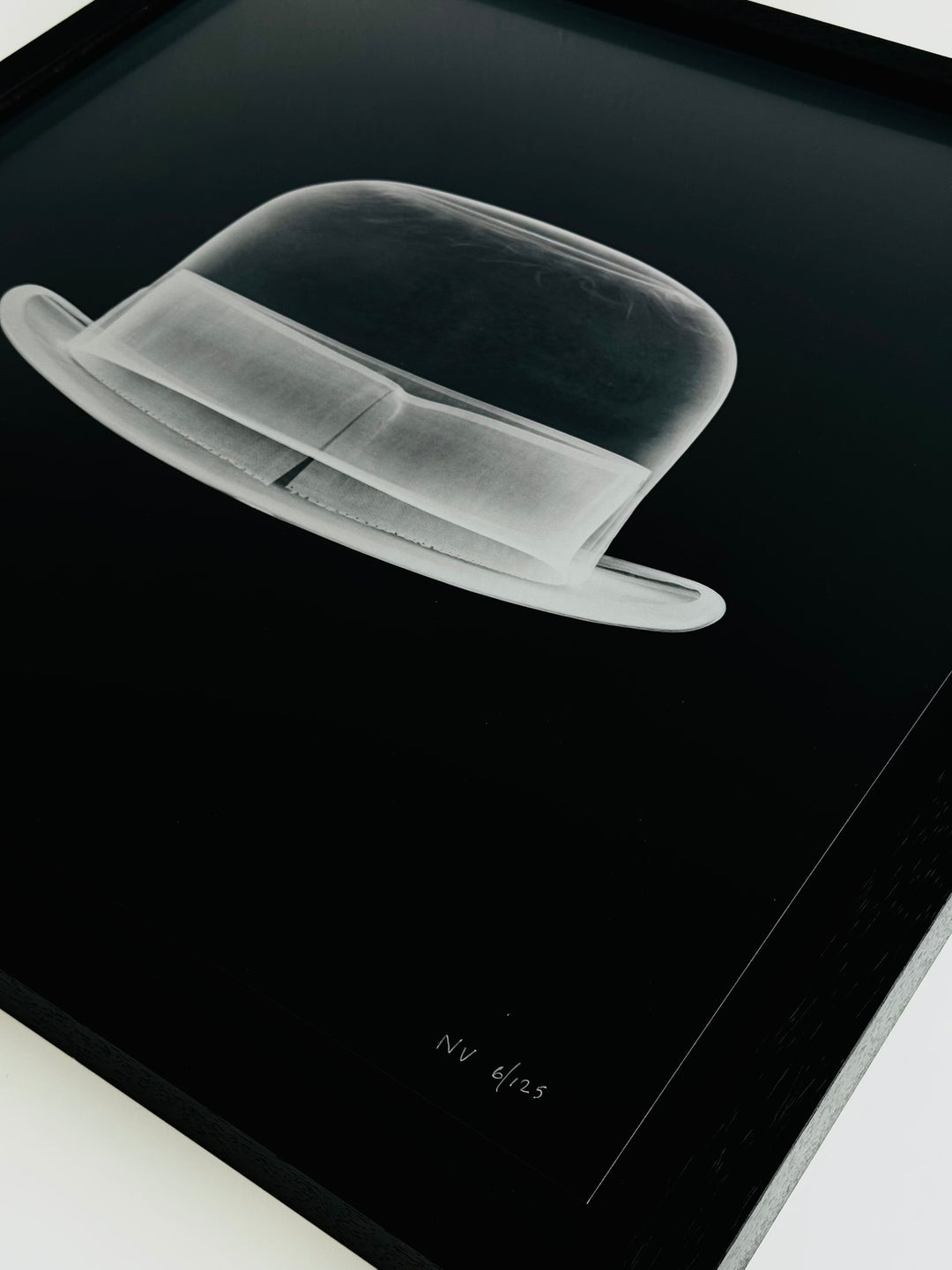 SiLVER BOWLER HAT.