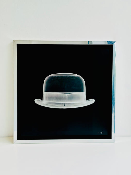 SiLVER BOWLER HAT.