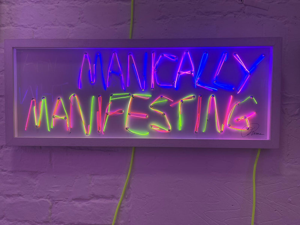 MANiCALLY MANiFESTiNG