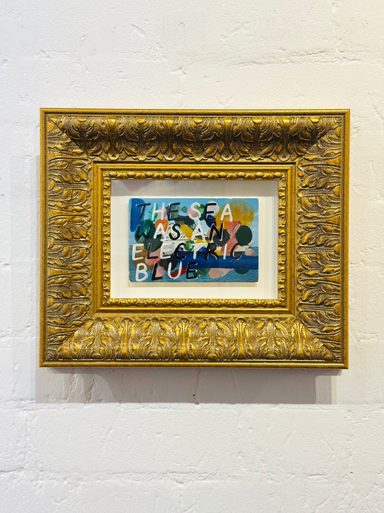 THE SEA WAS AN ELECTRiC BLUE