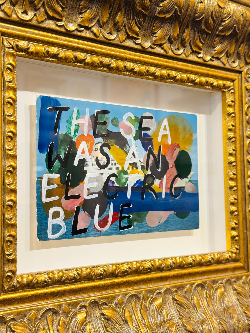 THE SEA WAS AN ELECTRiC BLUE